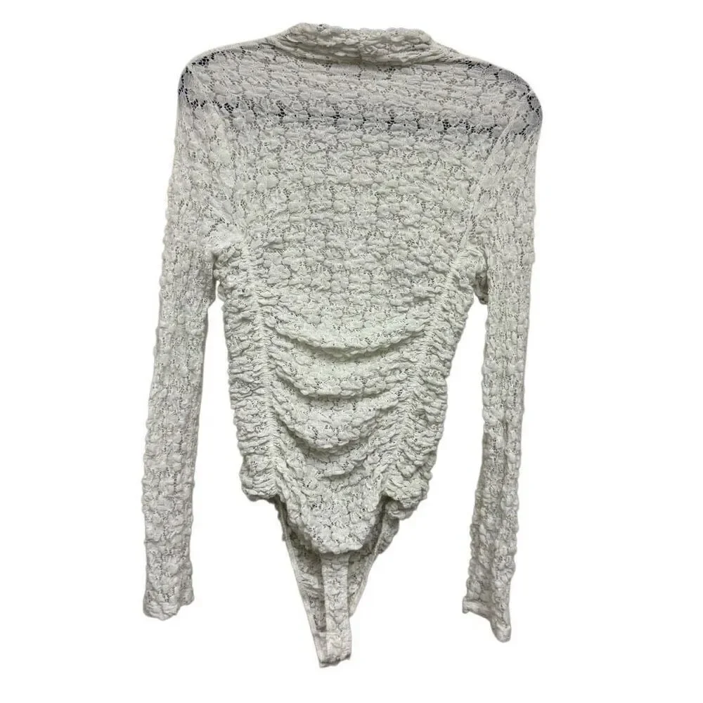 Free people white crotchet style long sleeve bodysuit size medium